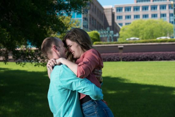 couple huggin in park