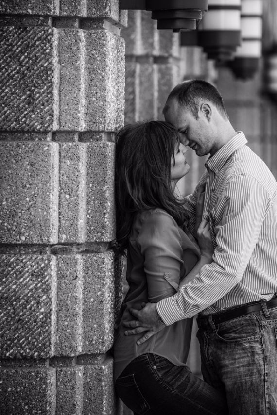 Engaged couple embracing