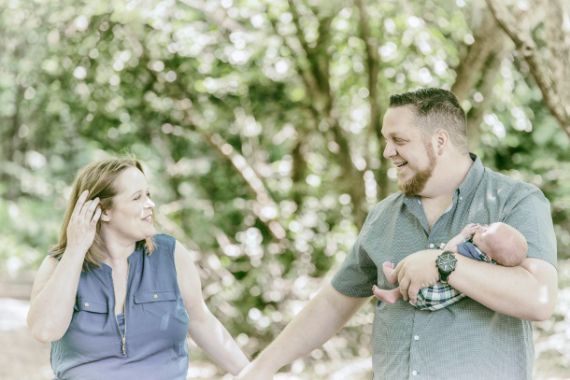 Happy couple with newborn baby